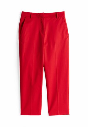 Pantalons rouges avec une texture lisse, coupe ajustée et poches avant. Dotés d'un devant plat et d'une coupe droite, terminés par des passants de ceinture.