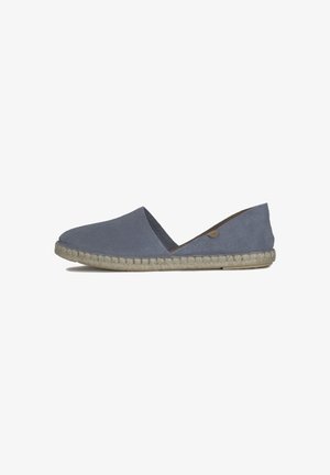 Gray suede espadrille slip-on shoe with a jute rope sole and a low-cut design. Features a stitched edge and a small accent detail.