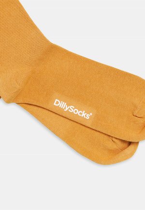 Orange gerippte Socken aus weichem Stoff mit einem weißen DillySocks-Logo. Das Design ist glatt und hat eine bequeme Form.