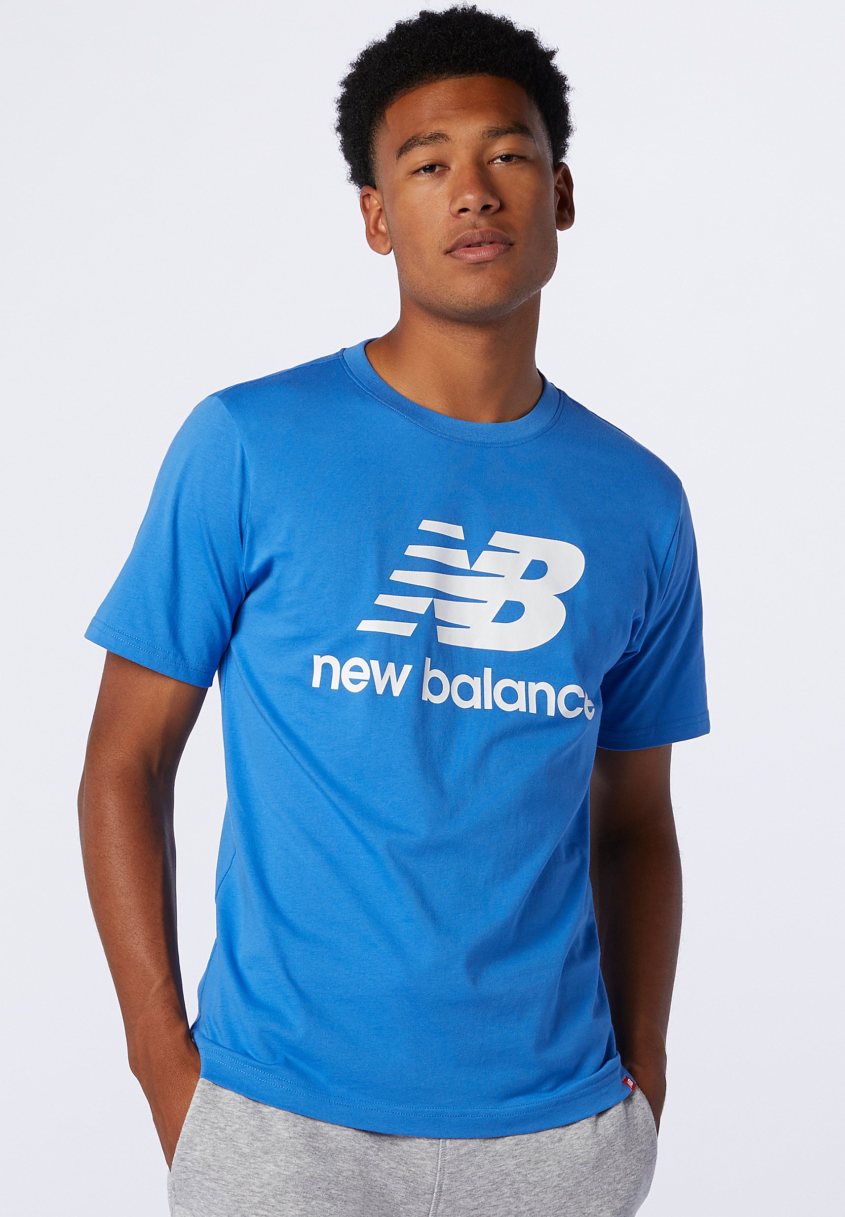 New Balance ESSENTIALS STACKED LOGO - Camiseta estampada - faded cobalt/azul  - Zalando.es