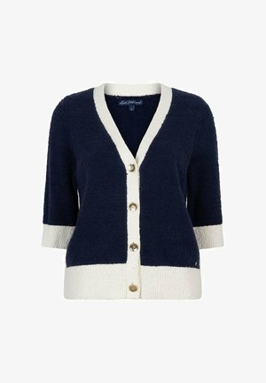 Marineblauwe cardigan met witte bies op de kraag, manchetten en zoom, voorzien van vier gouden knopen en driekwart mouwen.