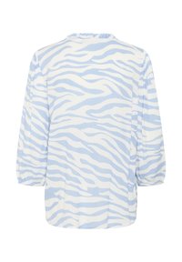 Blusa ligera en patrón de cebra azul y blanco. Presenta un escote redondo y mangas abullonadas, con un corte holgado. Tejido texturizado.