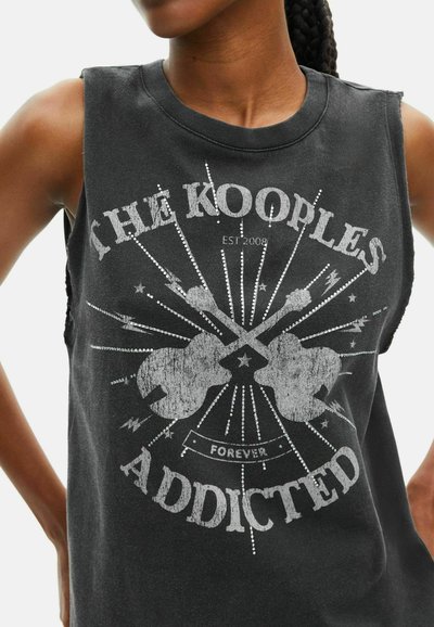 Zwarte mouwloze graphic t-shirt van katoen, met een versleten ontwerp met gitaren, sterren en de tekst "The Kooples Addicted."