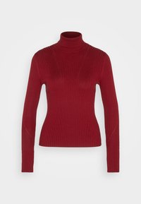 Pull à col roulé côtelé rouge avec manches longues, coupe ajustée et détails subtils de coutures diagonales. Confectionné en tissu tricoté texturé.