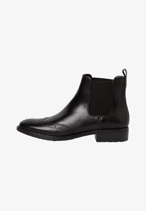 Black leather Chelsea boot with brogue detailing, elastic side panels, low heel, and pull tab at the back.