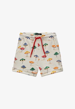 Shorts en coton avec une taille élastique et un cordon de serrage rouge. Présente un fond crème avec des motifs de parapluies colorés et des poignets roulés.