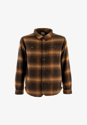 Brązowa i pomarańczowa koszula w kratę z miękkiego materiału, z dwiema kieszeniami na piersiach z zatrzaskami, zapinana na guziki z kołnierzykiem.