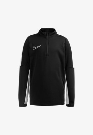 Black athletic pullover with a half zip, Nike logo on chest, and white side panels. Made of soft, stretchy fabric, featuring long sleeves.