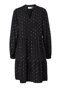 Robe noire à manches longues avec col en V, jupe à volants et petites paillettes multicolores réparties uniformément sur le tissu.