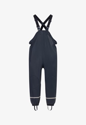 Donkere waterdichte overalls met verstelbare gekruiste schouderbanden, elastische enkels, kniestukken en reflecterende banden boven de manchetten.