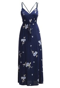 Navyblauwe lange jurk met dunne bandjes, strikceintuur en een lichtblauw-wit bloemenpatroon.