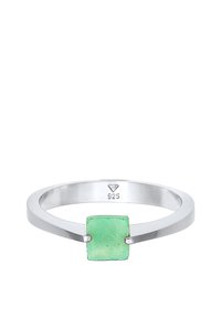 Bague en argent avec une pierre précieuse carrée de couleur vert clair, au design minimaliste. Métal estampillé "925" pour la qualité argent sterling.