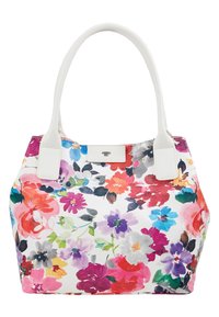 Květinová taška přes rameno s bílým pozadím, živé multi-barevné květiny a hladké bílé uši. Obsahuje malé kovové logo.