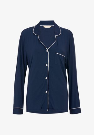 Haut de pyjama à manches longues bleu marine avec boutons et passepoil blanc le long du col, des poignets et de la poche, fabriqué en tissu doux.
