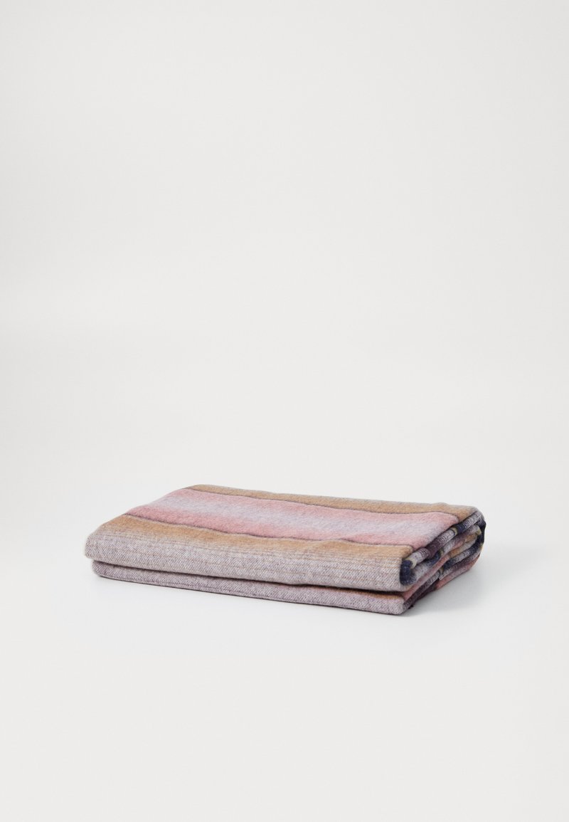 Folded blanket with soft, textured wool featuring horizontal stripes in pink, brown, and grey tones. Neatly arranged with rounded edges.
