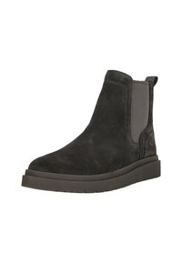 Bottine Chelsea en daim noir avec panneaux latéraux élastiques et semelle en caoutchouc épaisse, conçue pour un usage décontracté.