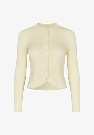 Cárdigan de manga larga en color crema con textura acanalada, cuello redondo y botones en la parte delantera, con un dobladillo ligeramente curvado.