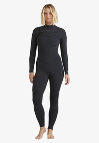 Black wetsuit featuring long sleeves, a fitted design, reinforced knee patches, and adjustable straps at the neck for a secure fit.