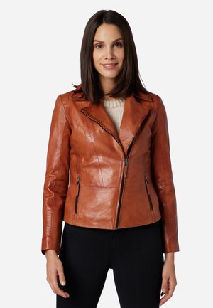 Brown leather jacket with a fitted design, embellished pockets, and a notched collar. Smooth texture, with a zip front closure.