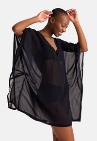 DORINA MOKOLO COVER UP - Rannatarvikud - black