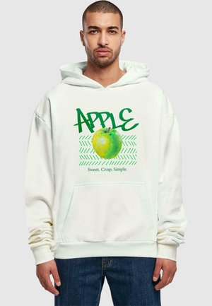 White hoodie featuring a green apple graphic with "APPLE" in bold green text and "Sweet. Crisp. Simple." in smaller text below.