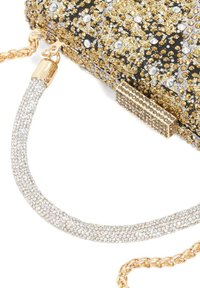 Beaded clutch with gold and black design, adorned with rhinestones. Features a metallic clasp and two chain handles: one gold, one jeweled.