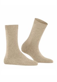 Un paio di calzini beige a vita alta con polsini a costine, mostrati affiancati su uno sfondo bianco.