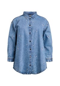 Light blue denim shirt with a button-down front, long sleeves, and embroidered floral accents. Features a classic collar and relaxed fit.