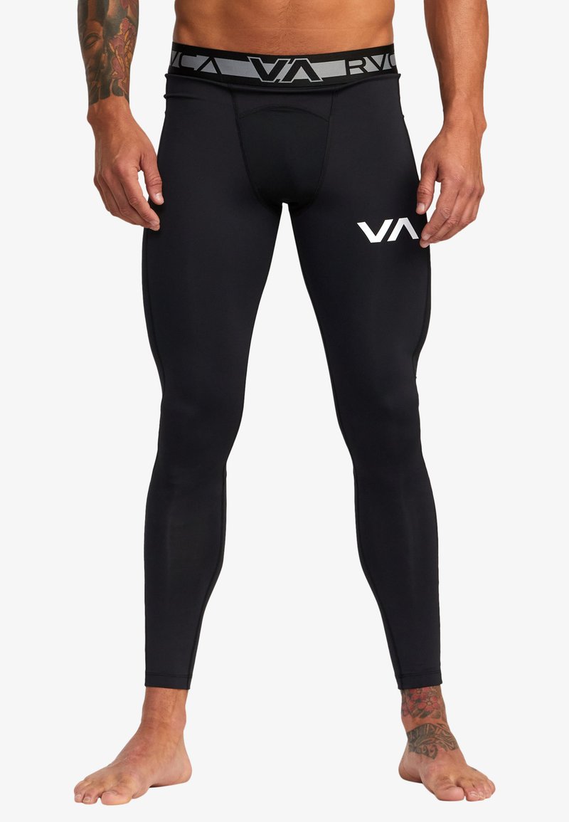 Sorte atletiske leggings med en tætsiddende pasform, lavet af strækbart stof. Har en grå talje med et logo og et forstærket støtteområde.