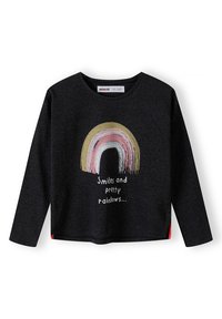 Schwarzes Langarmshirt mit einem bunten Regenbogen-Motiv in Gold, Pink und Weiß, mit dem Text "Lächeln und schöne Regenbögen..." darunter.