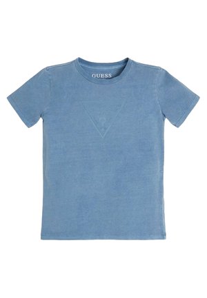 T-shirt bleu à manches courtes avec un col rond et un logo triangulaire en relief discret indiquant "GUESS" sur le devant.
