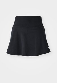 Skort atlético negro con una cinturilla suave, dobladillo acampanado y sutil logo de Nike en la parte inferior derecha. Fabricado con tejido elástico y ligero.