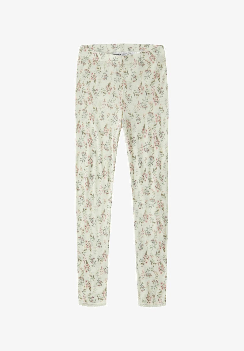 Pantalon slim couleur crème avec un délicat motif floral rose et vert, taille élastique et jambes longues.