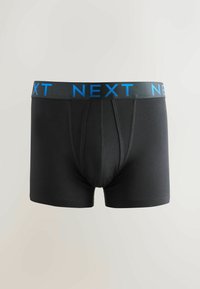 Boxer ajustados negros con un logo azul "NEXT" en la cinturilla elástica. Fabricados con material suave, cuentan con un ajuste ceñido y una textura lisa.