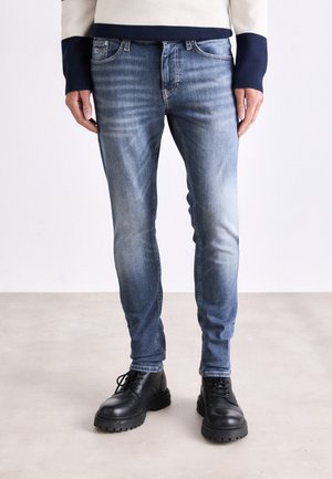 Jeans Tapered Fit - dark-blue denim