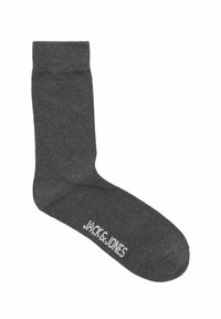 Šedá bavlněná ponožka s pružným lemem a hladkou strukturou, s bílým brandingem "JACK & JONES" blízko oblasti prstů.