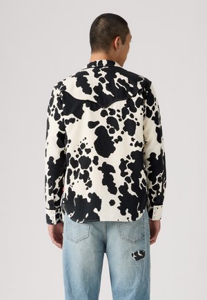 TOY STORY RODEO - Ing - x ts cow print shrt black white