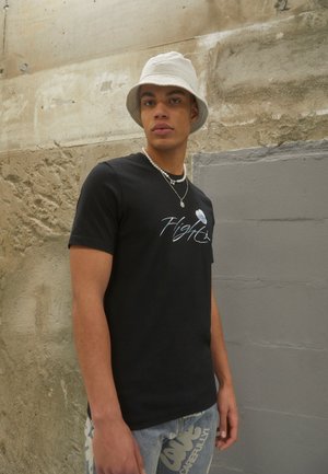 Puma GRAPHICS SPORT TEE - Camiseta Estampada - Black/negro