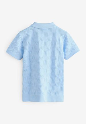 Polo à manches courtes bleu clair avec un motif tissé texturé, doté d'un col et de poignets côtelés. Matière douce en tricot.