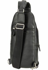 Sac en cuir noir en bandoulière avec une surface texturée, une sangle noire réglable, des accessoires en argent et plusieurs compartiments zippés pour le rangement.