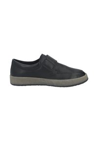 Black leather shoe with a textured finish, featuring a Velcro strap and a grey rubber sole. Rounded toe and low-profile design.