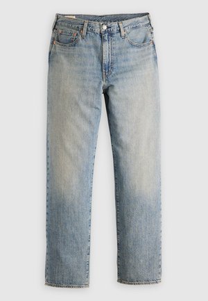 Lyseblå denimjeans med lige ben, fem lommer og synlige syninger. Bleg vask og detaljer i messing.