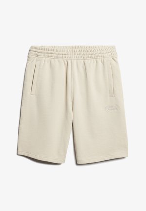 Shorts de sport beige en tissu doux, dotés d'une taille élastique, de deux poches latérales et d'un détail de logo brodé.