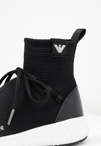 Emporio Armani Sneakers hoog black/zwart (Pre-owned)