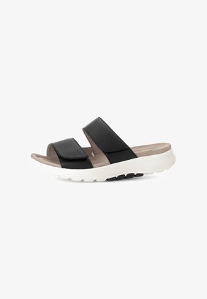 Black leather slide sandals with two wide straps, contoured footbed, and a cushioned white rubber sole featuring a textured design.