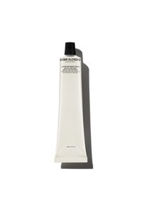 White tube of Grown Alchemist Age-Repair Moisturiser, featuring a black cap, flat shape, and minimalist black text label. Size: 65ml.