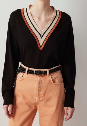 Stickad tröja - black