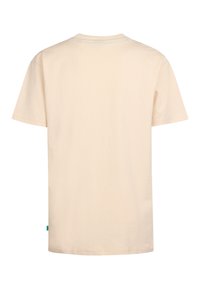 Kortaf shirt in lichtbeige katoen. Heeft een ronde hals en een klein turquoise label aan de linkerkant van de zijnaad. Eenvoudig ontwerp, geen patronen.