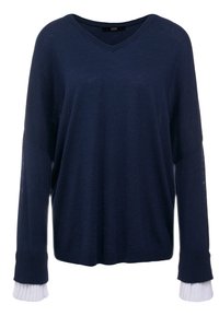 Granatowy sweter z dekoltem w serek i długimi rękawami, z białymi plisowanymi mankietami. Miękka tkanina, luźny krój i minimalna ilość szwów dla schludnego wyglądu.