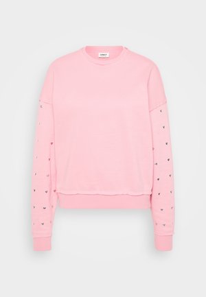 Sweatshirt rosa com decote redondo, design cropped e mangas longas, apresentando motivos de corações prateados ao longo das mangas. Material de algodão macio.